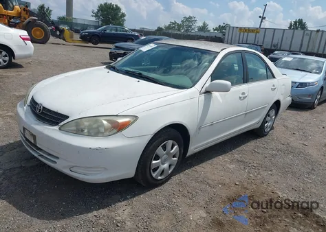 2002 Toyota Camry Le z USA, uszkodzony, nr VIN 4T1BE32K22U007484